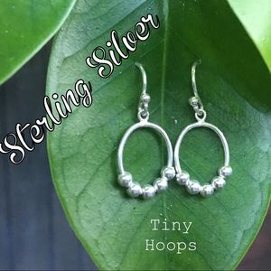 Little silver dangling earrings
